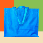 Bolsa grande con asa de cinta fabricada en Poliéster o Canasta